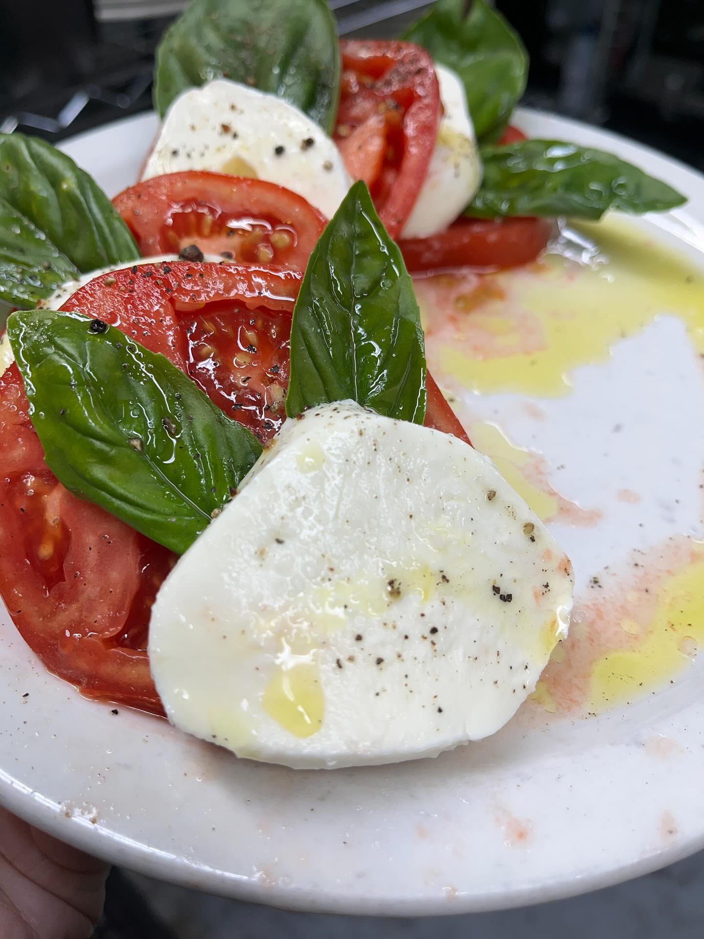 Fresh Caprese salad with mozzarella, tomatoes, and basil